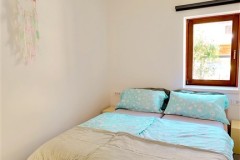 Good Vibes bedroom 1